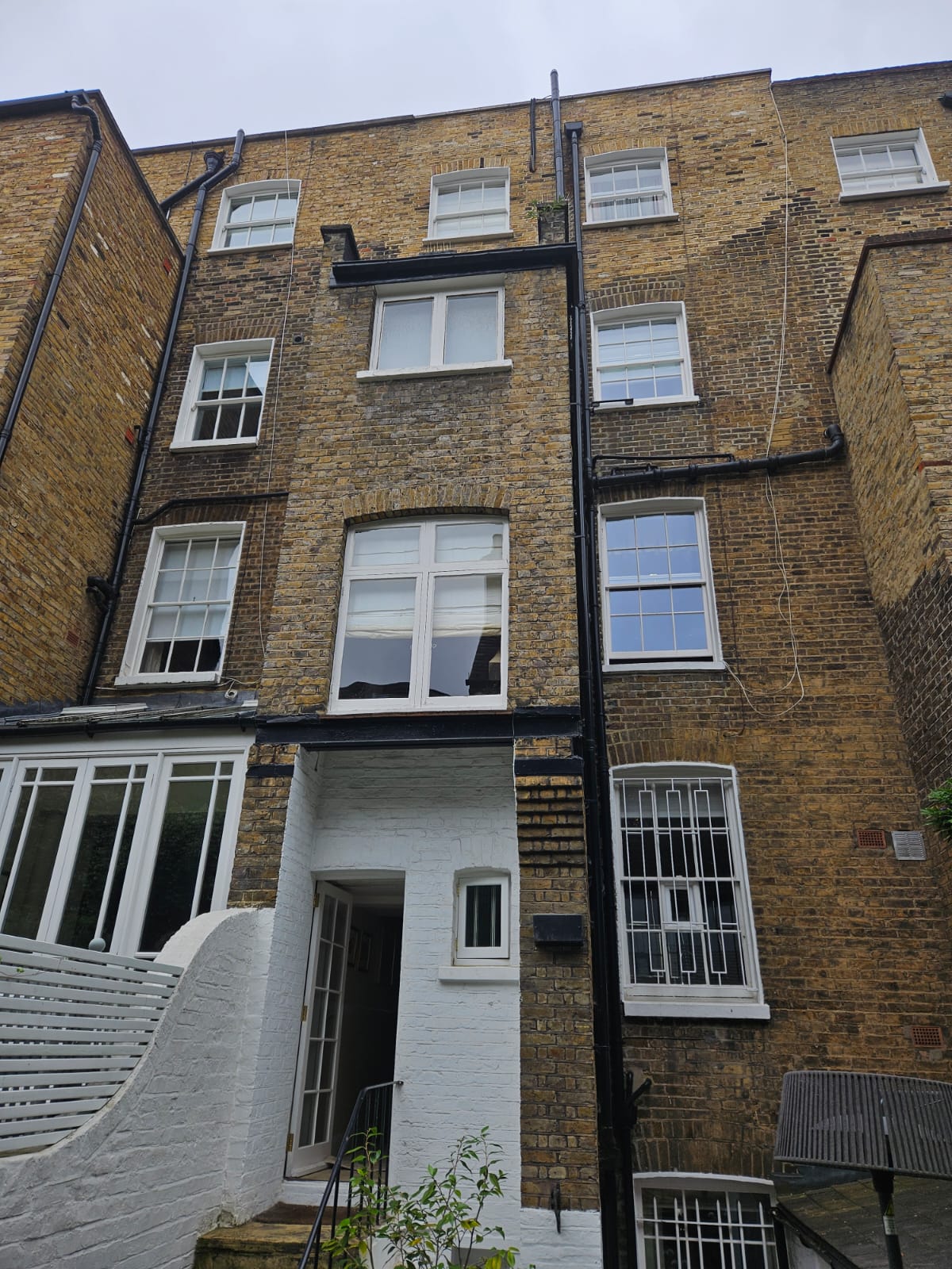 Repaired and repainted elevation at Moore Street, SW3