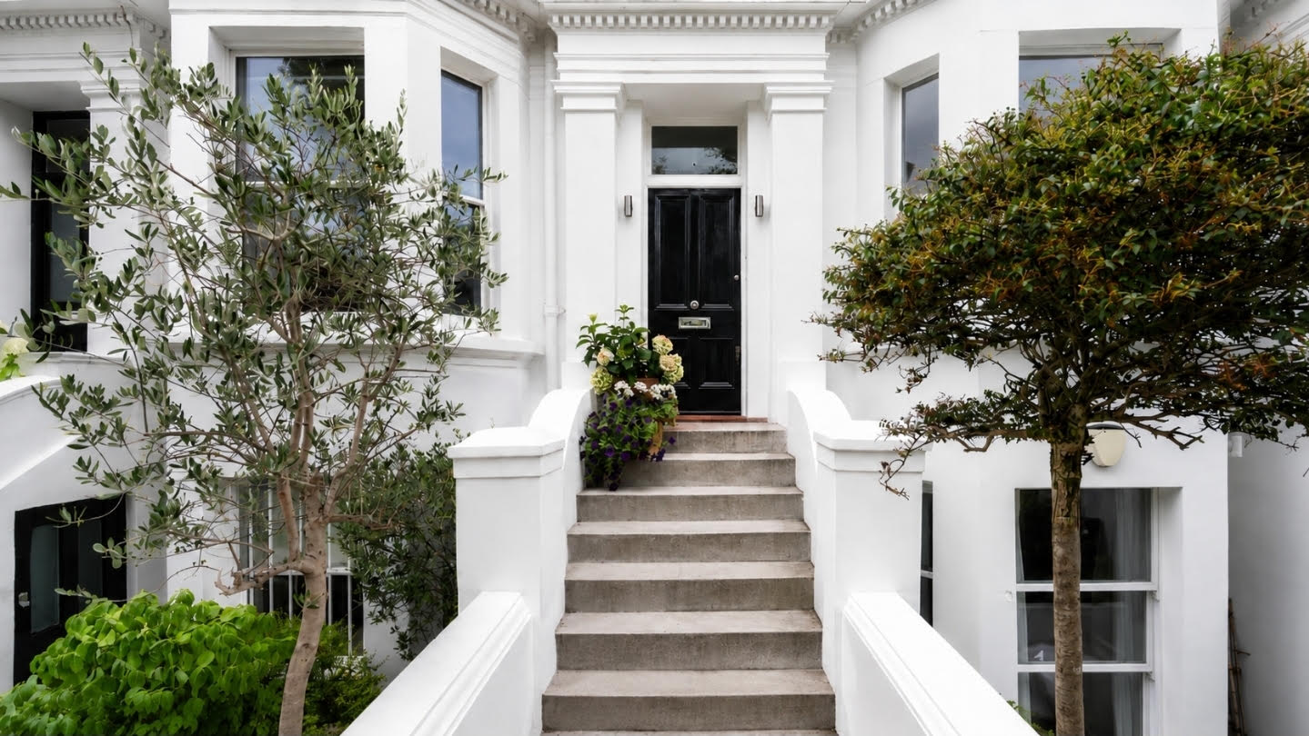 Entrance steps and rendered porch detail at Sunningdale Gardens