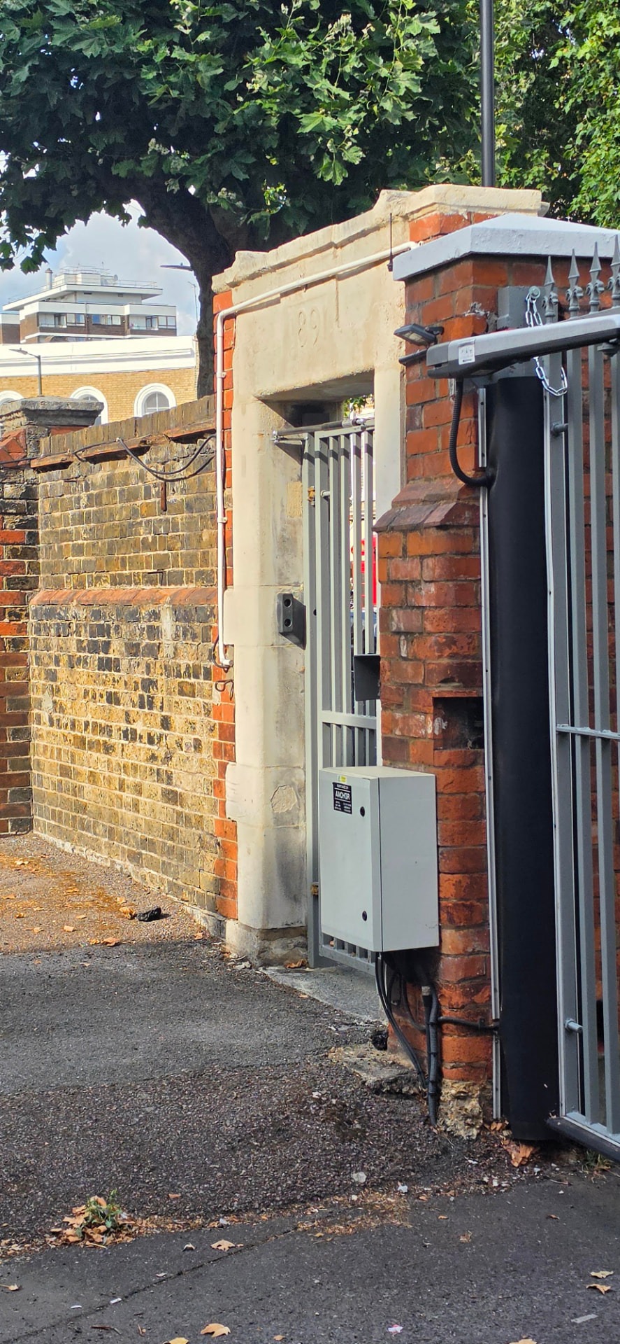 Cleaned stone gate pier and brickwork, Victoria Park E9