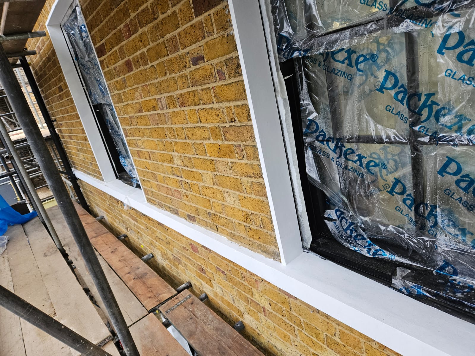 Repointed brickwork and new window surrounds from the scaffold