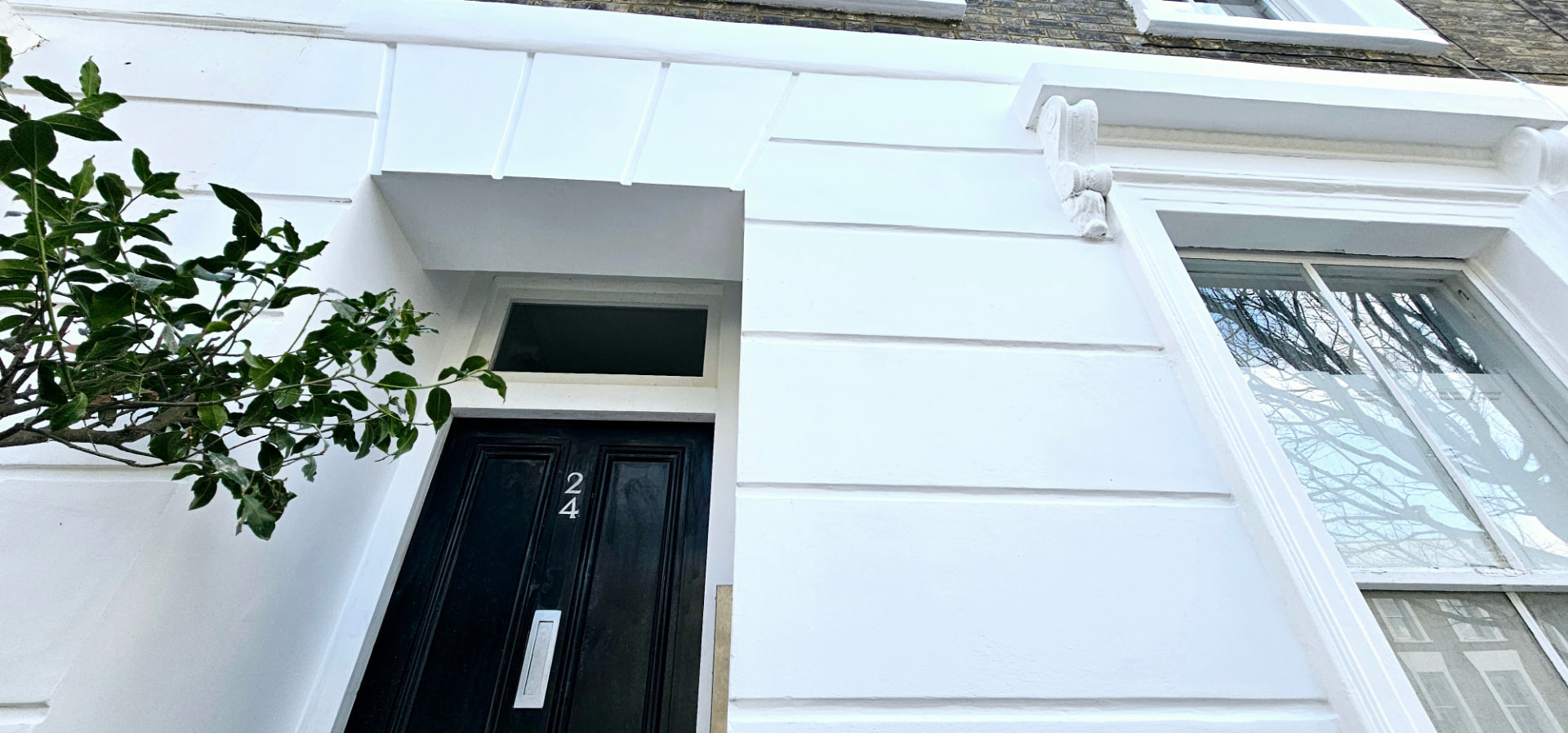 Holloway Road — Stucco repair, rendering, repointing & roof works